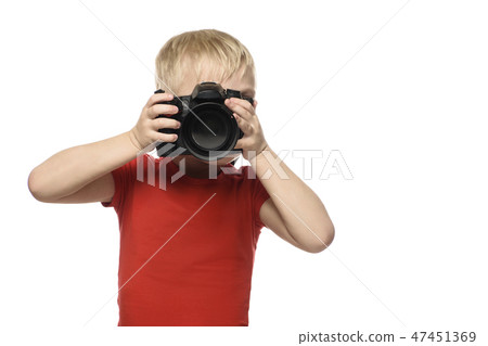 Young blond boy with camera. Portrait, isolated 47451369