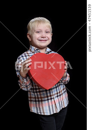 Smiling blond boy in checkered shirt Smiling blond boy in checkered shirt 47451539