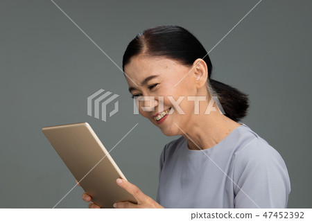 Elderly Aging Society 60s years old using touch Elderly Aging Society 60s years old using touch 47452392