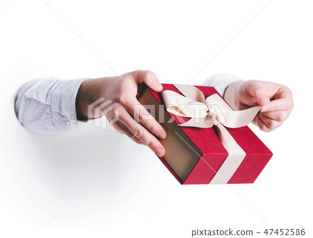 Man holding a gift box. Man holding a gift box. 47452586