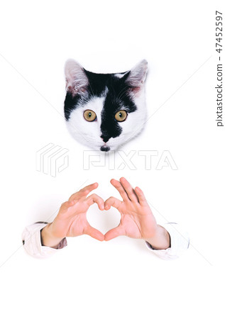 Young man forming shape of heart with his hands. Young man forming shape of heart with his hands. 47452597