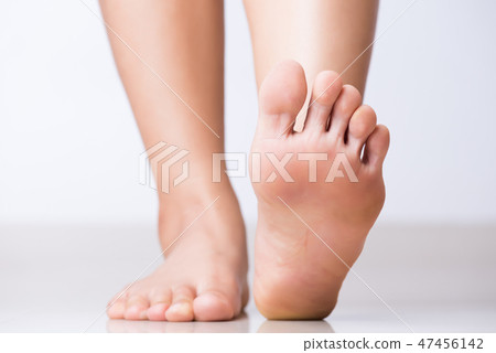 Closeup female foot pain, Healthcare concept. 47456142