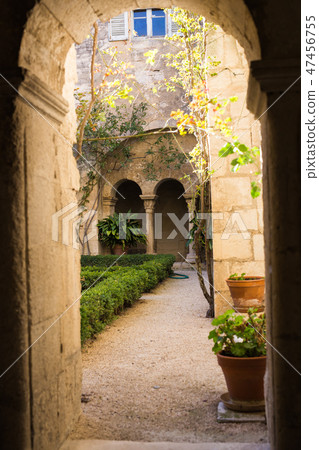 Architecture, exterior and design concept - Arches of long niche leading in Mediterranean courtyard Architecture, exterior and design concept - Arches of long niche leading in Mediterranean courtyard 47456755