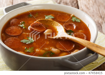 Delicious Polish dish of Breton beans with sausage Delicious Polish dish of Breton beans with sausage 47458415
