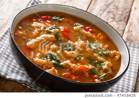 Polish soup flaczki with vegetables in tomato Polish soup flaczki with vegetables in tomato 47458426