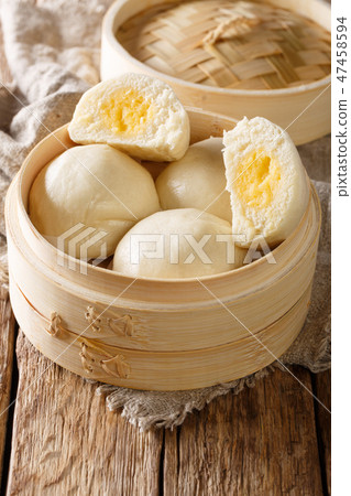 Liu Sha Bao, Salted Egg Yolk Custard Streamed Bun Liu Sha Bao, Salted Egg Yolk Custard Streamed Bun 47458594