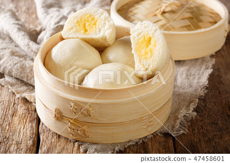 Cantonese steamed custard buns closeup 47458601