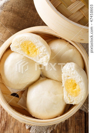 Chinese traditional steam custard buns closeup Chinese traditional steam custard buns closeup 47458603