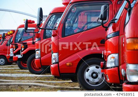 Fire trucks lined up in a row at the New Year's parade 47458951
