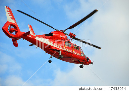 A firefighting and disaster prevention helicopter performing a demonstration flight at the New Year's parade A firefighting and disaster prevention helicopter performing a demonstration flight at the New Year's parade 47458954