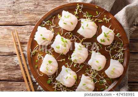 Traditional Chinese dim sum with shrimp filling Traditional Chinese dim sum with shrimp filling 47458991