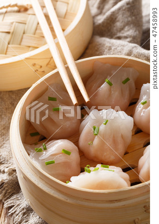 Homemade dumplings dim sum with stuffed shrimp Homemade dumplings dim sum with stuffed shrimp 47458993