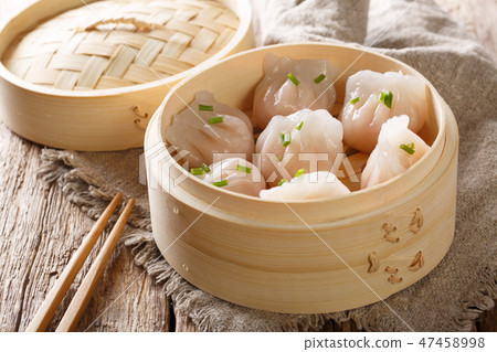 Steamed shrimp dumplings dim sum  close-up 47458998