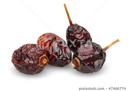 Heap of dried rose hips Heap of dried rose hips 47466774