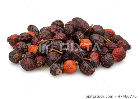 Heap of dried rose hips Heap of dried rose hips 47466776