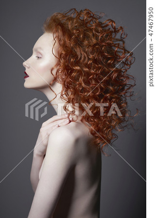 Beautiful nude woman with red-hair and red lips. Beautiful nude woman with red-hair and red lips. 47467950