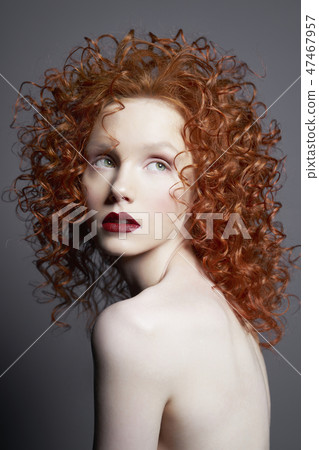 Beautiful nude woman with red-hair and red lips. Beautiful nude woman with red-hair and red lips. 47467957