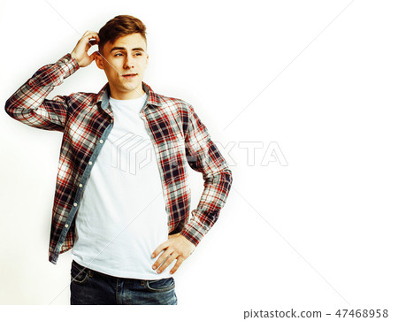 young handsome teenage hipster guy posing emotional, happy smiling against white background isolated 47468958