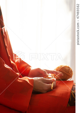 A woman wearing a woman wearing a red kimono Kimono A woman wearing a woman wearing a red kimono Kimono 47469382