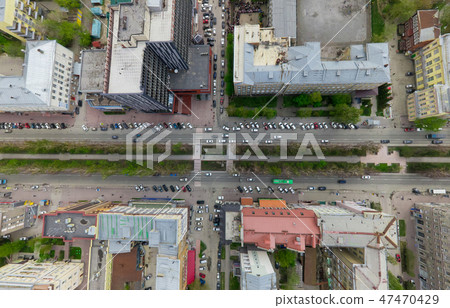 Aerial city view with crossroads and roads, houses buildings. Copter shot. Panoramic image. 47470429
