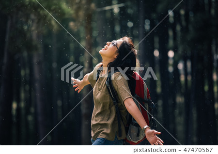 backpacker enjoy holiday in pine tree forest backpacker enjoy holiday in pine tree forest 47470567