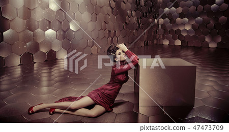 Fabulous woman in shiny golden room Fabulous woman in shiny golden room 47473709