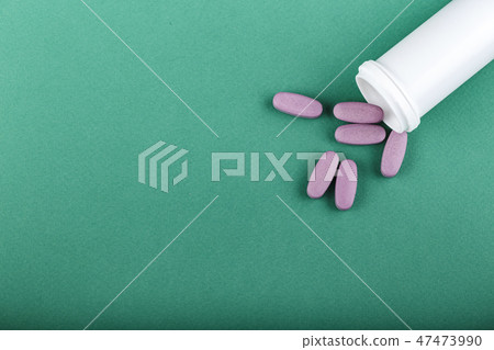 scattered pink pills scattered pink pills 47473990