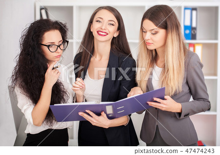 A group of successful businessmen. Discussion of the important contract of the company. A group of successful businessmen. Discussion of the important contract of the company. 47474243