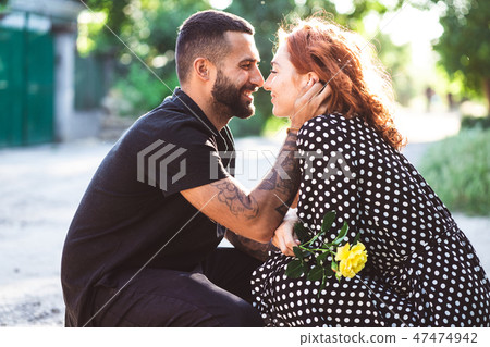 guy and girl are resting in the park 47474942