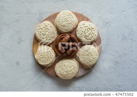 Moroccan pancakes. Arabic pancakes with dates. Moroccan pancakes. Arabic pancakes with dates. 47475502