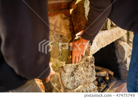 Decorating fireplace with rocks old vintage design 47475749