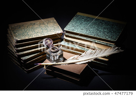 old books, papers, ink pen and inkpot 47477179