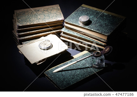 old books, papers, ink pen and inkpot old books, papers, ink pen and inkpot 47477186