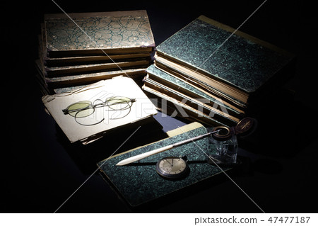 old books, papers, ink pen and inkpot old books, papers, ink pen and inkpot 47477187