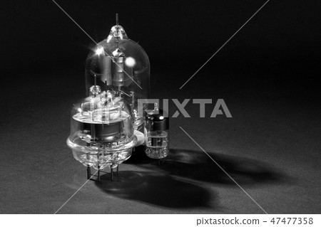 Old vacuum tube. Black and white. Old vacuum tube. Black and white. 47477358