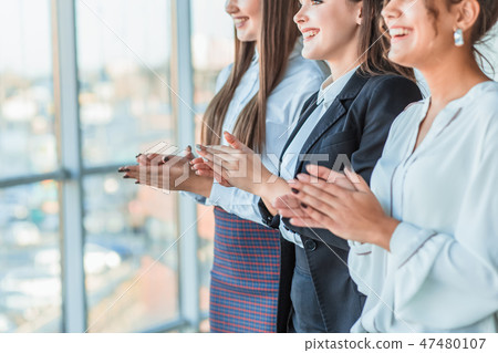 Three businesswomen working in the office. Positive workplace concept. Three businesswomen working in the office. Positive workplace concept. 47480107