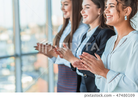 Three businesswomen working in the office. Positive workplace concept. Three businesswomen working in the office. Positive workplace concept. 47480109