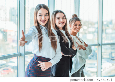 Young pretty business girls show a good gesture. Young pretty business girls show a good gesture. 47480391