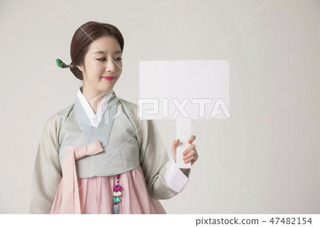 Korean beauty concept photo. Young beautiful woman wearing Hanbok, Korean traditional dress. 293 47482154