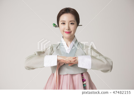 Korean beauty concept photo. Young beautiful woman wearing Hanbok, Korean traditional dress. 278 47482155
