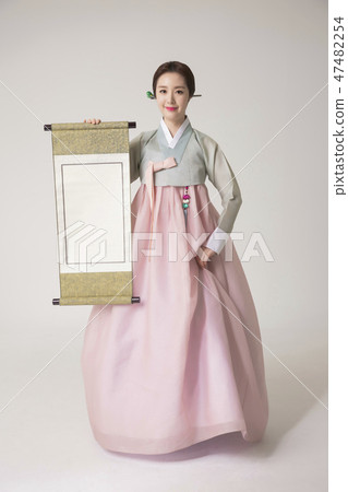 Korean beauty concept photo. Young beautiful woman wearing Hanbok, Korean traditional dress. 306 47482254