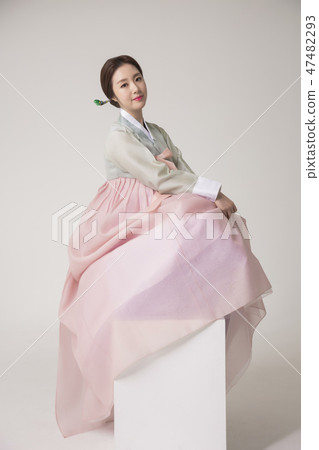 Korean beauty concept photo. Young beautiful woman wearing Hanbok, Korean traditional dress. 266 47482293