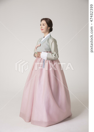 Korean beauty concept photo. Young beautiful woman wearing Hanbok, Korean traditional dress. 204 47482399