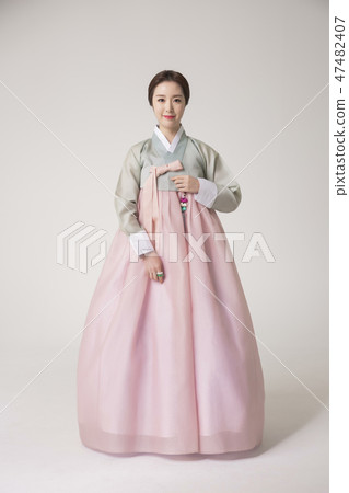 Korean beauty concept photo. Young beautiful woman wearing Hanbok, Korean traditional dress. 196 47482407