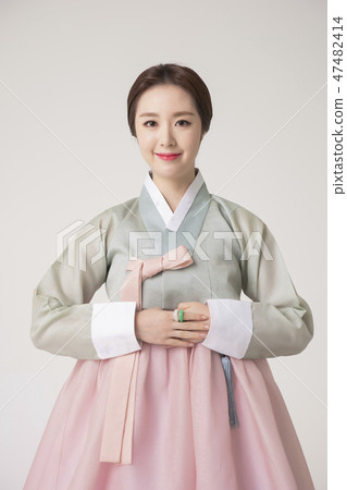Korean beauty concept photo. Young beautiful woman wearing Hanbok, Korean traditional dress. 224 Korean beauty concept photo. Young beautiful woman wearing Hanbok, Korean traditional dress. 224 47482414
