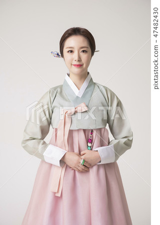 Korean beauty concept photo. Young beautiful woman wearing Hanbok, Korean traditional dress. 185 47482430