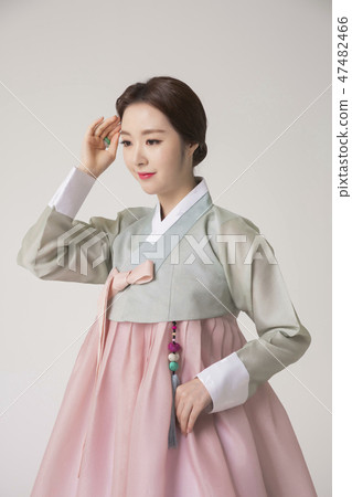 Korean beauty concept photo. Young beautiful woman wearing Hanbok, Korean traditional dress. 207 Korean beauty concept photo. Young beautiful woman wearing Hanbok, Korean traditional dress. 207 47482466