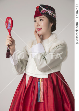 Korean beauty concept photo. Young beautiful woman wearing Hanbok, Korean traditional dress. 073 47482515