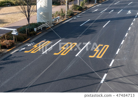 50 km speed limit pavement marking on the road 47484713