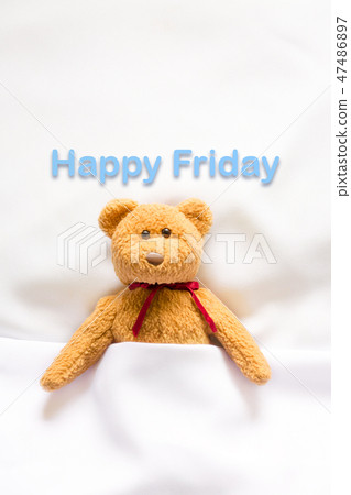 Teddy Bear lying in bed with message" Happy Friday Teddy Bear lying in bed with message" Happy Friday 47486897